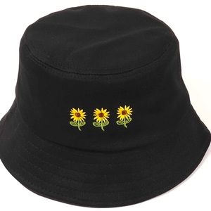 NWOT floral black bucket hat with sunflowers.